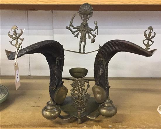 An unusual horn and brass ritualistic stand